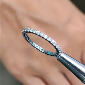 10k white gold moissanite eternity band
